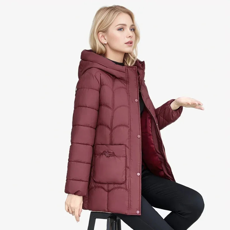 2024 Winter Damen Daunen Baumwolle warme Mäntel neue stilvolle Midi-Länge Kapuze leichte gepolsterte Parkas Taschen lose Jacke weiblich