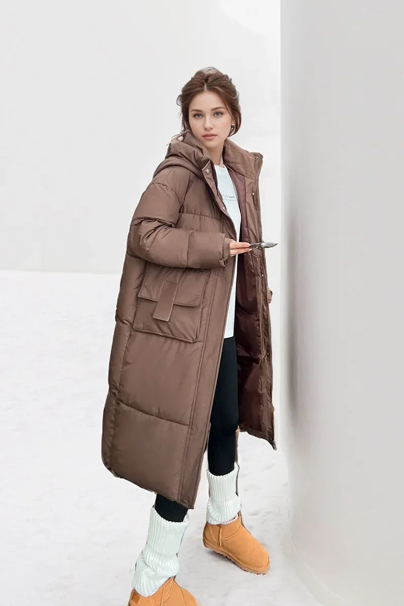 2024 neue Frau Daunen Baumwoll jacke Winter langen Mantel Kapuze große Taschen Mode warme dicke Reiß verschluss Mantel weiblichen Wintermantel