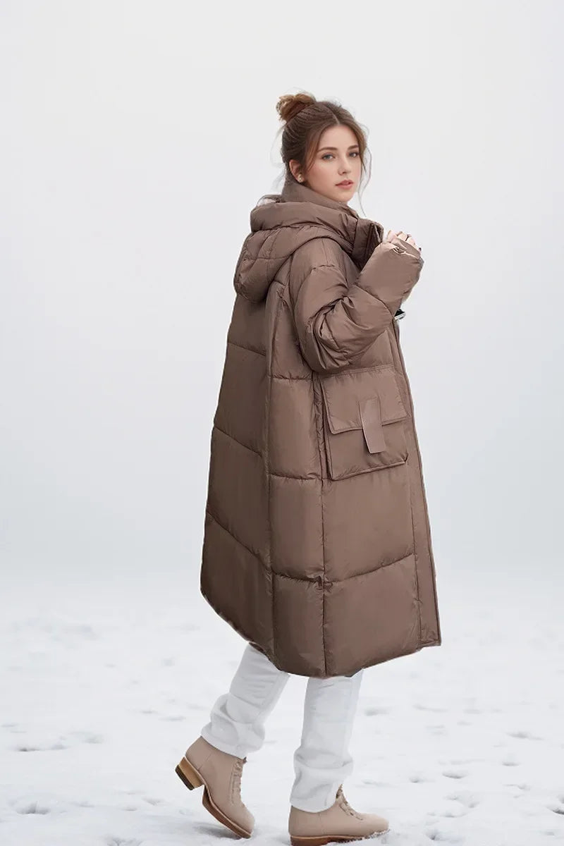 2024 neue Frau Daunen Baumwoll jacke Winter langen Mantel Kapuze große Taschen Mode warme dicke Reiß verschluss Mantel weiblichen Wintermantel