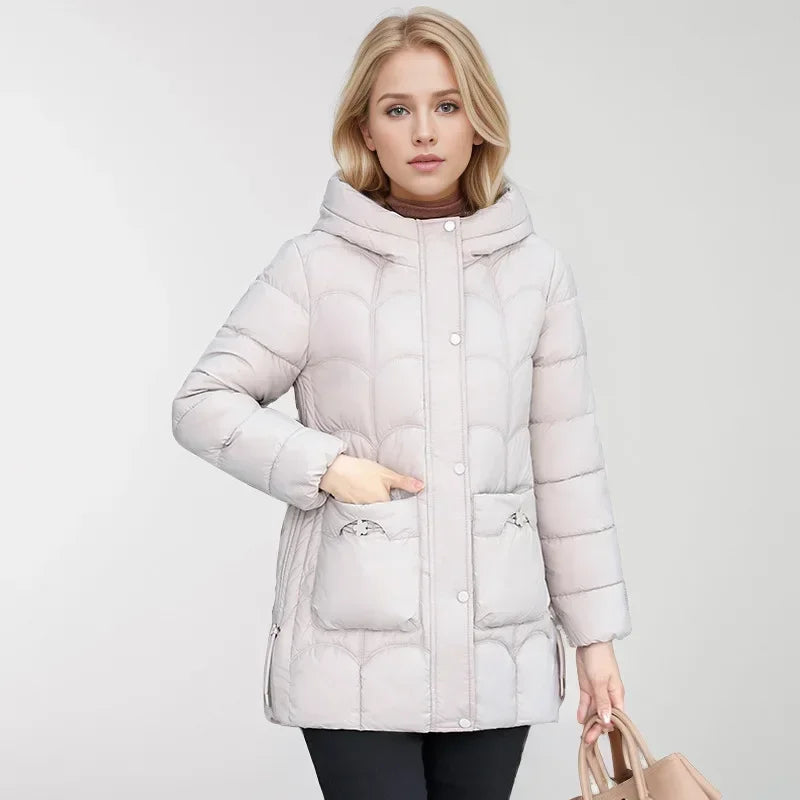 2024 Winter Damen Daunen Baumwolle warme Mäntel neue stilvolle Midi-Länge Kapuze leichte gepolsterte Parkas Taschen lose Jacke weiblich