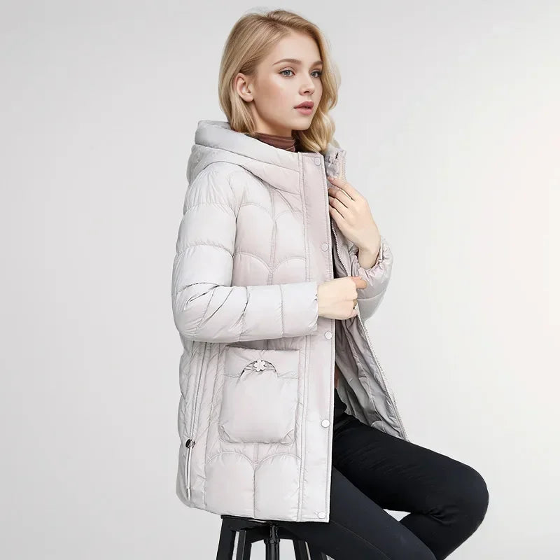 2024 Winter Damen Daunen Baumwolle warme Mäntel neue stilvolle Midi-Länge Kapuze leichte gepolsterte Parkas Taschen lose Jacke weiblich